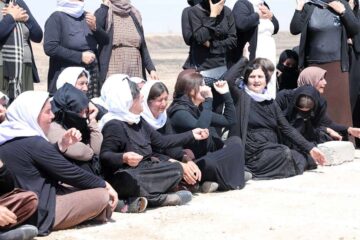 Women of Kocho whose fathers, brothers or husbands were killed. The woman with her hand in the air is Khatoon Ahmed al Jaso, daughter of the Mandkany tribal leader killed Aug 15, 2014 in Kocho.